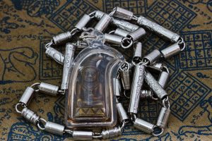In a modern innovation, many Thai amulets are sold pre-enclosed in waterproof cases